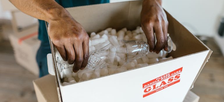 A person getting items ready to be shipped with one of the best shipping companies in Philadelphia