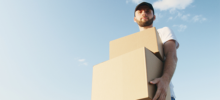 movers carrying boxes