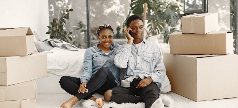 couple calling movers