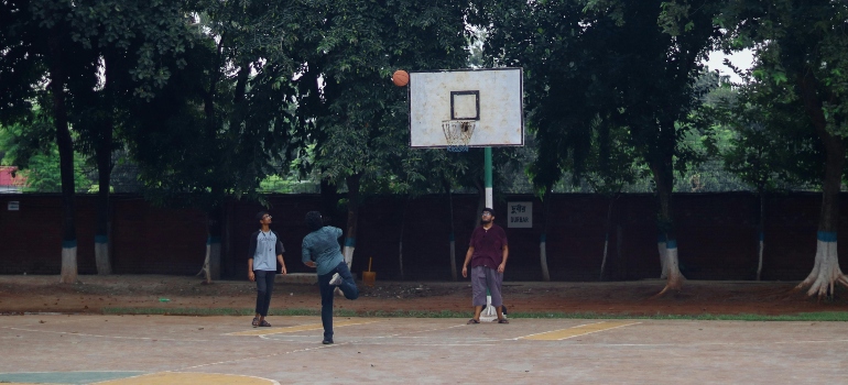 Men playing basketball