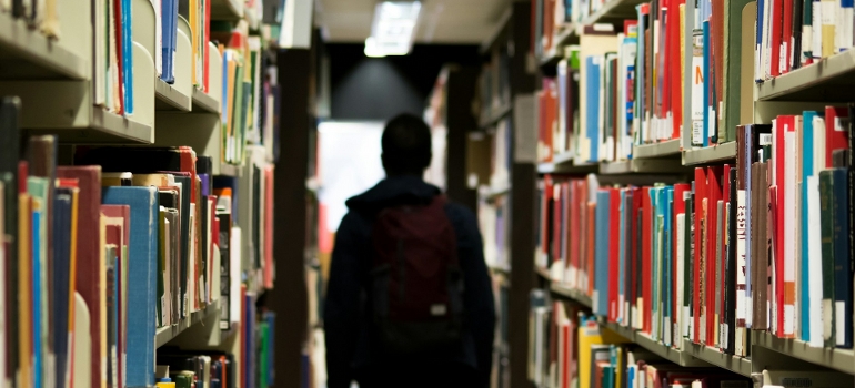 a kid in a school library