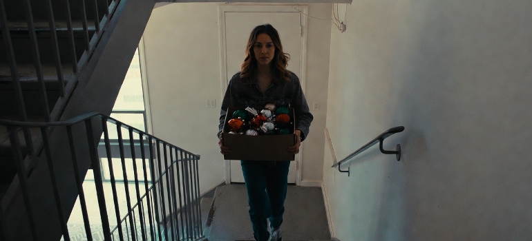 carrying boxes with ornaments