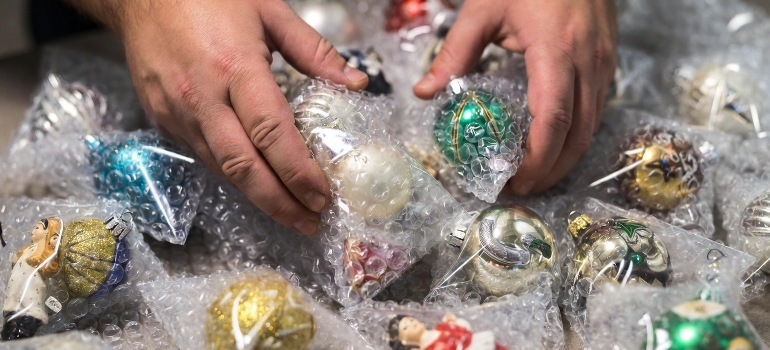 using bubble wrap to move Christmas ornaments to Philadelphia